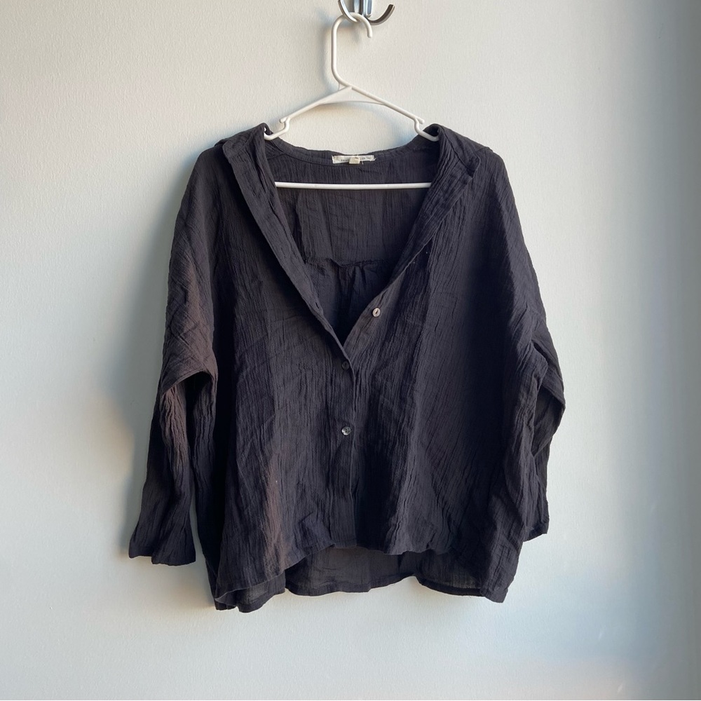 Navy shirt with button-up front and flowy